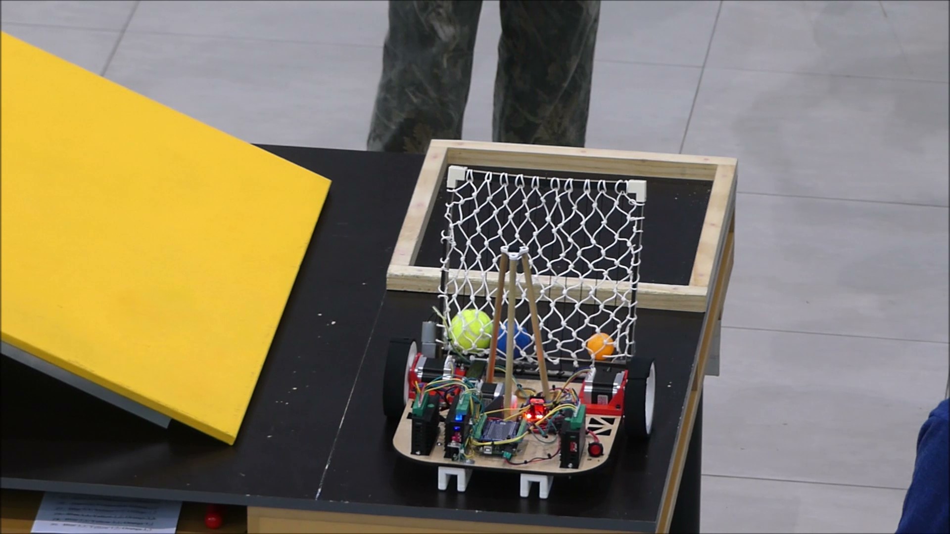 Second testing day, robot successfully deposited two of three balls placing us in second place.
